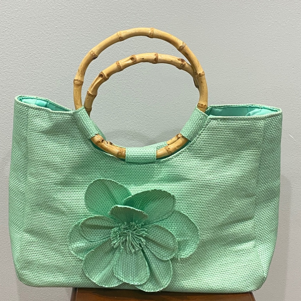 Neiman Marcus bamboo and burlap floral purse.